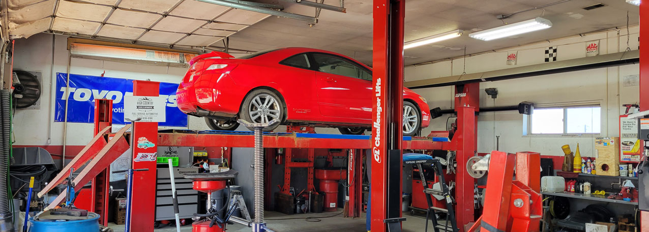 A car on the lift in the High Country automotive shop
